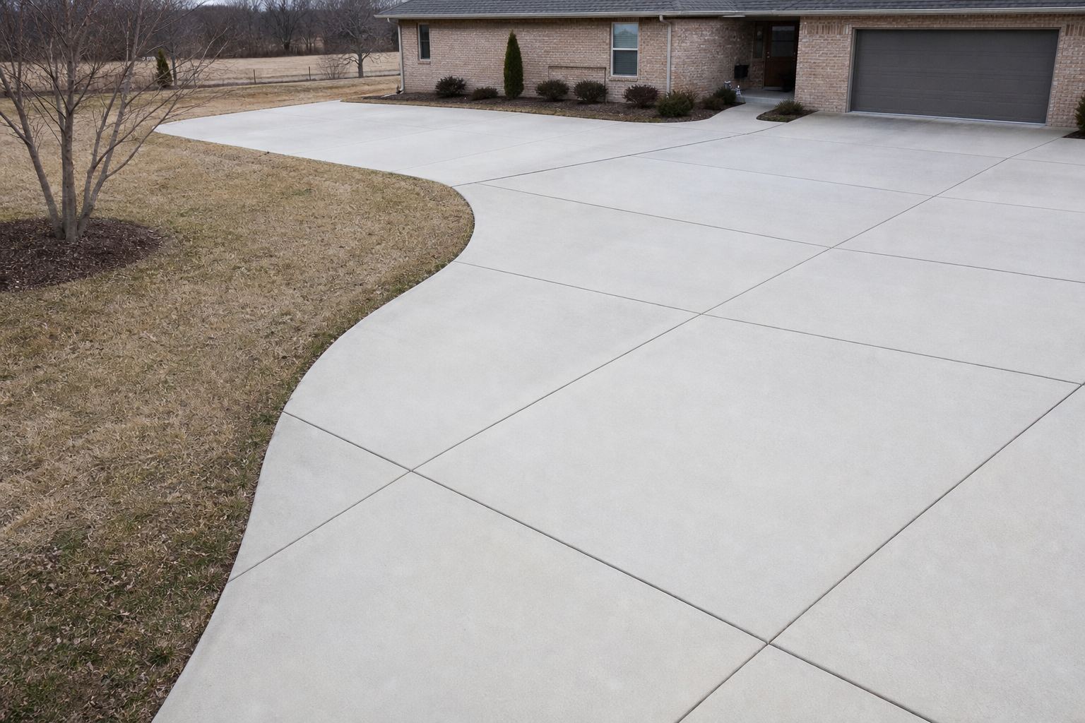Elevated view of a curved residential concrete driveway